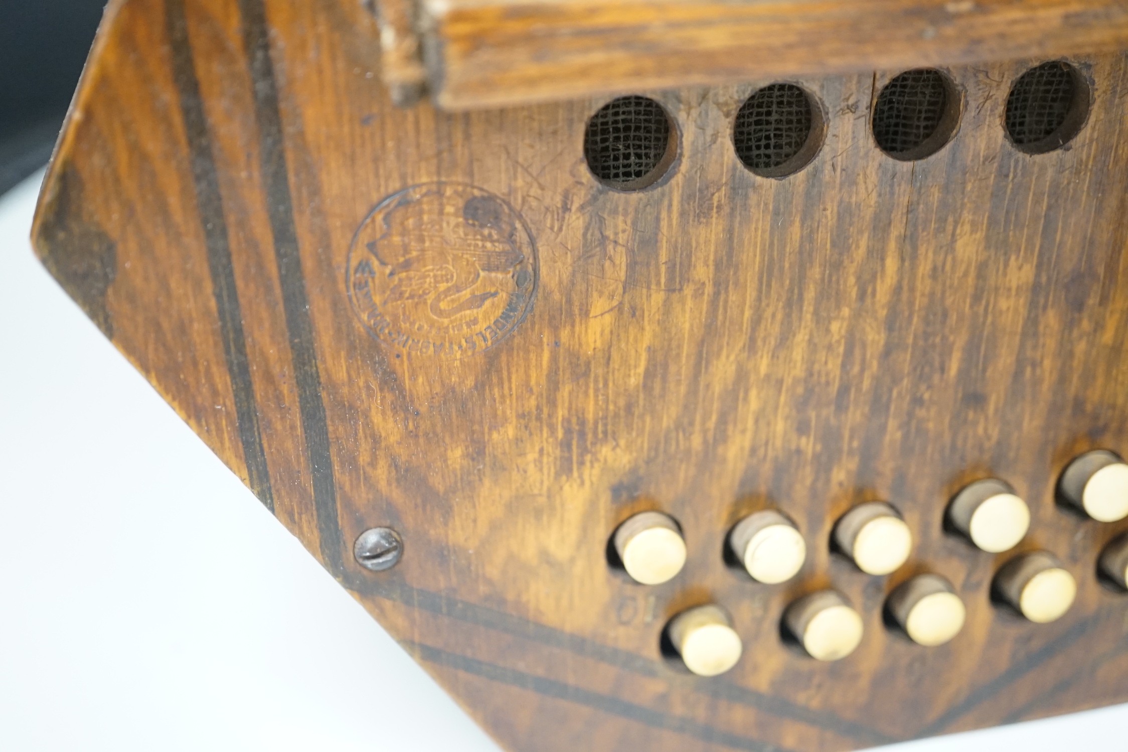 A Hohner Mignon accordion and an Empress concertina